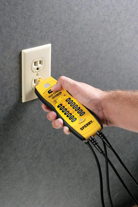 Voltage And Continuity Tester With Non Contact AC Detection 50 600V AC Range DC Polarity Indication in use with wall outlet