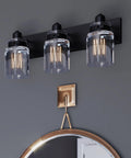Calhoun Collection Clear Glass Farmhouse Bath Vanity Light Three Light Antique Bronze Finish with Thick Glass Shades