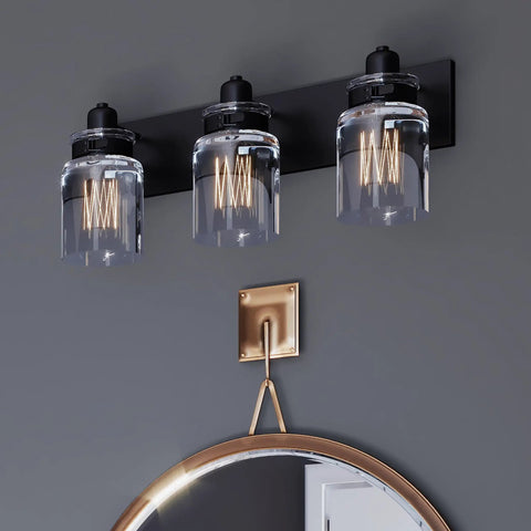 Calhoun Collection Clear Glass Farmhouse Bath Vanity Light Three Light Antique Bronze Finish with Thick Glass Shades