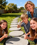 Family with kids giving thumbs up on 4 Pack Round Stepping Stone Molds For Concrete, 13.6 Inch Diameter And 1.53 Inch Depth pathway.