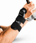Wrist-X Golf Swing Training Aid with Audible Click Feedback worn on wrist during a swing, adjustable 0 to 70 degrees shown in use.