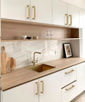 Modern kitchen with 10 Pack Champagne Bronze Knurled Cabinet Pulls, 5 Inch 128mm on white cabinets, featuring a sleek, stylish design.