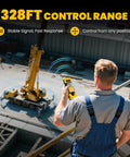 Operator using Crane Remote Control 12V 4 Button Wireless Hoist Controller for industrial cranes on a rooftop, yellow device visible.