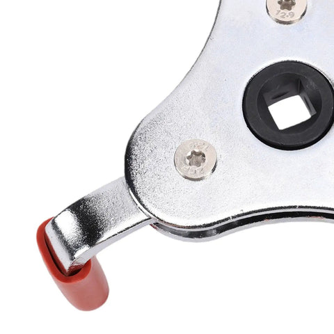 Close-up of Smoke Detector Removal Tool And Fire Alarm Battery Changer Claw Gripper Head with ratchet socket interface.