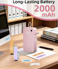 Slick Portable Bluetooth Label Maker With Wireless Tape, Compact Handheld Sticker Printer For Quick Adhesive Labels, Dope Pocket Sized Smart Thermal Device That Prints Crisp Labels No Cap on a desk with adhesive labels.