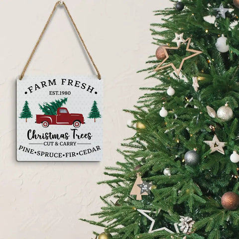 Red Pickup Truck With Christmas Tree Rustic Wood Sign For Winter Farmhouse Wall Art Cozy Festive Homey Vibes Holiday Home Kitchen Bathroom Porch Decor 7x7 Inch Xmas Front Door Rustic Decor next to a decorated Christmas tree.