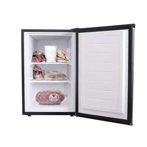 A Top Shelf 3 Cubic Foot Midi Upright Freezer In Stainless Steel With Reversible Door And Adjustable Feet For Basements Or Break Rooms This Sweet Space Saver Delivers Zero Fuss Setup And Drops Heavy Chill Wherever You Park It Today with meat and frozen items visible inside.