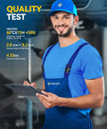 Mechanic in blue uniform holding a clipboard with quality test details about suspension parts in the background.