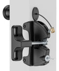 Heavy Duty Two Sided Gate Latch With Key Lock And Upgraded Spring Loaded Pull Cord mounted on white door, showcasing secure locking mechanism.