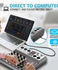 Person using Five Channel USB Bluetooth Audio Mixer With Echo Delay For Recording Live Streaming And Podcasting Dope Home Studio Sound Board connected to laptop.