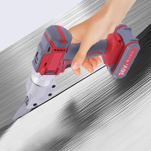 Powerful 21V Electric Metal Shears With Swivel Head And Two Batteries For Cutting Iron Aluminum Steel Tile Rechargeable High Speed Shear Tool in use on metallic surface.