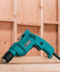 Powerful 4.9 Amp 3/8 Inch Drill With Variable Speed 0-2500 RPM Keyless Chuck Large Trigger Teal Finish Quiet Operation