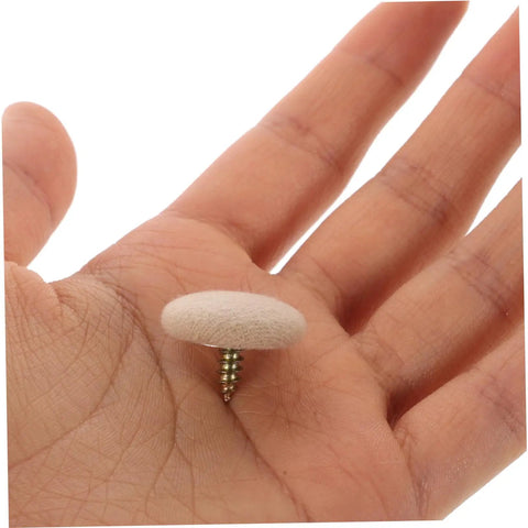 Close-up of snap rivet in hand from Headliner Repair Kit For Cars With Snap Roof Rivets, Easy Interior Ceiling Fix And Quick Installation
