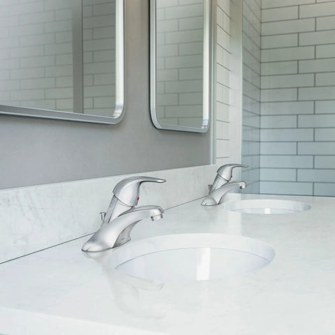 One-Handle Low Arc Bathroom Faucet Chrome Finish, 4-Inch Centerset Installation on white countertop with modern mirrors
