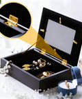 Gold Brass Tiny Hinges For Jewelry Boxes And Miniatures DIY Projects Includes 100 Hinges And 400 Screws 8 By 10 Millimeters With 6.5 By 5 Millimeter Hole Spacing Ideal For DIYers Wooden Boxes Cabinets And Miniature Furniture installed on a black jewelry box.