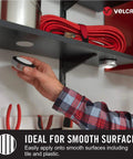 Heavy Duty Industrial Hook And Loop Fasteners With Rock Solid Adhesive Backing Water Resistant Sticky Pads For Indoor And Outdoor Use Tough Circular Disc Strips Hold Up To Ten Pounds, applying to a smooth surface.