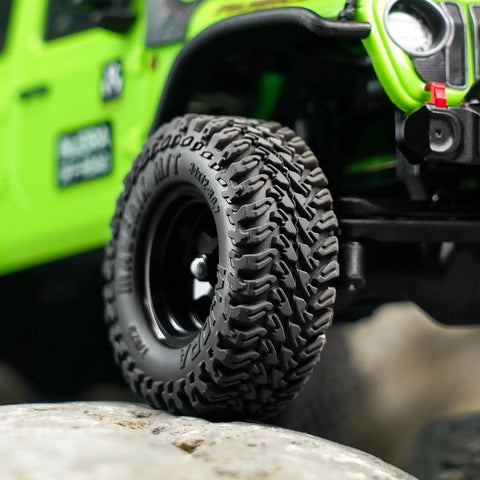 Close-up of Maverix MT RC Tires For 1 30 Scale Axial SCX30 showing dense tread and S5 compound on rocky terrain.