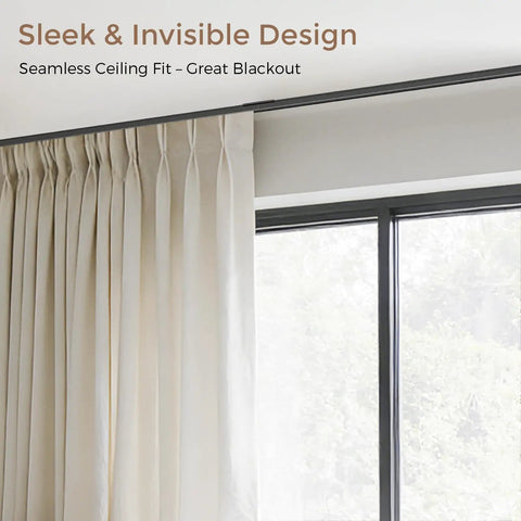 Heavy Duty Ceiling And Wall Mount Curtain Track System For 6 To 9 Ft Black Finish With Quiet Glide Rollers installed in living room.