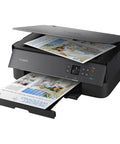 Wireless All In One Color Printer With Crisp Oled Touchscreen Display And Instant Wifi Access printing photos with documents coming out.