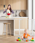 Woman cooking behind 36 Inch Extra Tall Black Baby Gate For Stairs And Doorways, 29 To 48 Inch Wide, Metal Safety Auto Close Gate with child playing