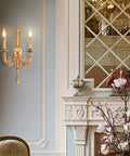 Premium All Copper Wall Sconces With Shatter Resistant Crystal Accents European Double Arm Wall Light Fixture For Living Room Or Foyer mounted beside elegant decor.