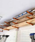 Wall Mount Lumber Rack Set, 3-Level Metal Wood Organizer For Long Objects And Gear in garage, installed, holding lumber and pipes