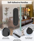 Black self-adhesive aluminum handle on glass door with strong backing for easy pull, showing installation in a stylish living room.
