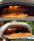 Gas Burner Attachment For Karu 12 Pizza Ovens Converts To Propane Heat Fast, Includes Valve Hose And Screws, Fits Karu 12G Fyra 12 And 12G Adapters in use showing pizza cooking with flames.