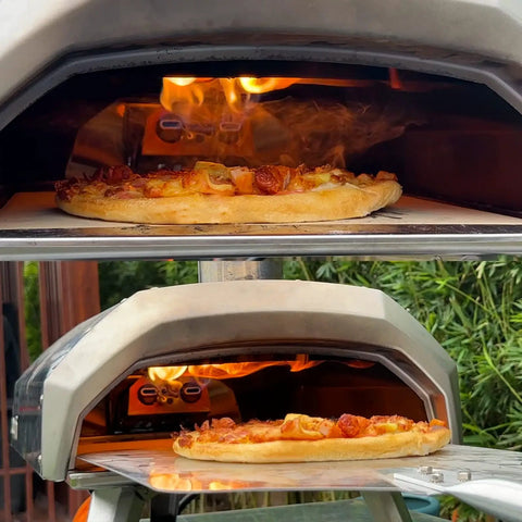 Gas Burner Attachment For Karu 12 Pizza Ovens Converts To Propane Heat Fast, Includes Valve Hose And Screws, Fits Karu 12G Fyra 12 And 12G Adapters in use showing pizza cooking with flames.