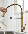High Arc Kitchen Faucet With Pull Down Sprayer And 360 Degree Swivel, Three Function Sprayer Head, Brushed Gold in use