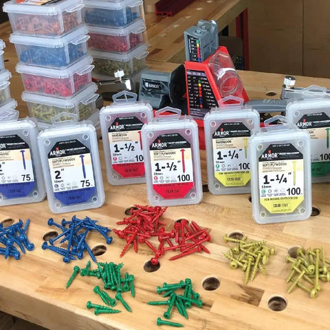 Assorted pocket hole screws on a workbench with containers, not showing Two And A Half Inch Coarse Thread Pocket Hole Screws 500 Pack