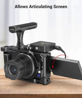 Formfitting Camera Cage For Sony ZV-1 II ZV-1F ZV-1 with ergonomically designed silicone gel grip and articulating screen on table.