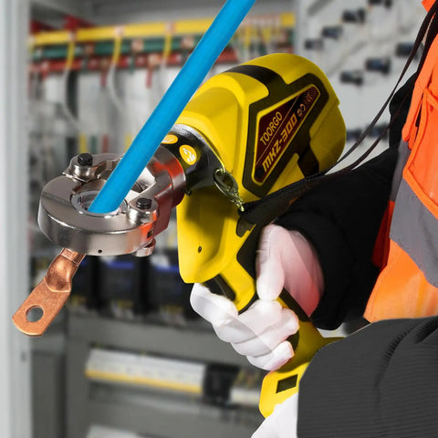 Heavy Duty Rechargeable Electric Wire Crimping Tool With Rotating Swivel Jaw And Complete Mold Kit Battery Powered Cable Lug Terminal Crimper in use on job site.