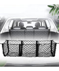 Three Pocket Trunk Cargo Net Made For Tesla Cybertruck 2024 Plus black mesh organizer in rear trunk area.