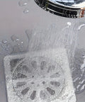 20 Pack Disposable Shower And Kitchen Drain Hair Catchers Keep Your Pipes Snatched With Dope Anti Clog Mesh Guards catching water.