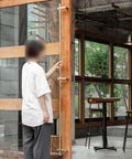 Extra Long Door Pull Handles Black Or Gold, Double Sided Push Pull Gate Handles With Round Bar Design, installed on a wooden door