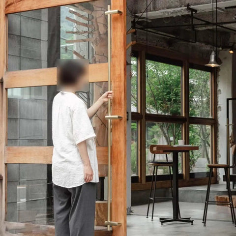Extra Long Door Pull Handles Black Or Gold, Double Sided Push Pull Gate Handles With Round Bar Design, installed on a wooden door