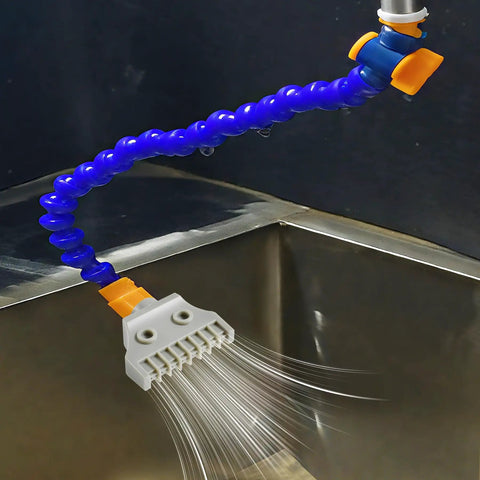 Two Pack G1/4 BSPT Male ABS Flat Nozzle Set for air blow off, attached to a flexible hose, spraying water, in a grey industrial setting.