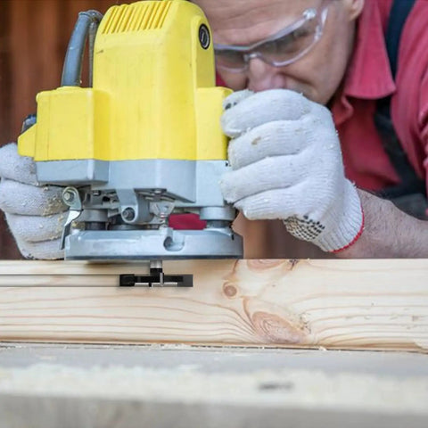 Man using a router with the Slab Flattening Router Bit Heavy Duty With One Quarter Inch Shank on a wooden board for surfacing.