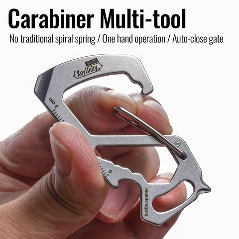 Close-up of Stainless Steel 7 Tool Carabiner Clip Multitool with Quick Release Clasp and bottle opener in hand.
