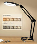 Hands Free Desk Magnifier With Light 10X And 5X Real Glass Anti Glare Lens, LED clamp lamp on a desk showing color modes.