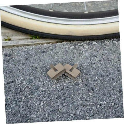 2 Pairs Bike Disc Brake Pads For Hydraulic And Mechanical Disc Brakes Replacement Pads by a mountain bike wheel