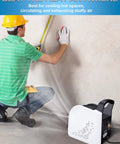 Person using air mover blower fan for floor drying and cooling at home job site garage or shop with three speeds portable utility fan