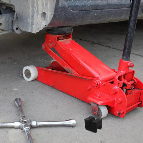 Red hydraulic car jack with Jack Pad Cover Kit For Car Jacks, Rubber Cushions Protect Pinch Welds And Frame Rails When Lifting visible