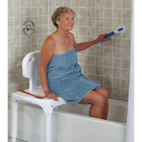 Universal Tub Transfer Bench Bath Seat With Backrest And Adjustable Legs For Left Or Right Hand Entry in bathroom with user