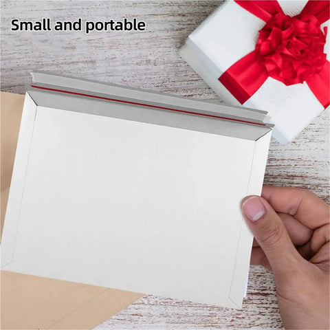 Hand holding Rigid Self Seal Mailers 100 Pack Cardboard Envelopes Keep Documents Flat Quick Self Seal Bags for mailing