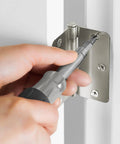 Heavy Duty Satin Nickel Door Hinge Wood Screws Number 9 X 1-1/2 Inch installation with a screwdriver on a door hinge.