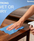 Person using Top Tier Heavy Duty Embossed Jumbo Roll Industrial Cleaning Wipes 10 By 15 Inches on wooden surface.
