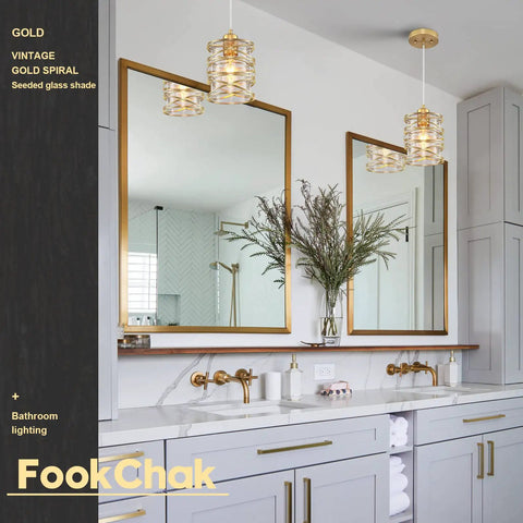 Gold Pendant Light Set Of 3 With Spiral Cage And Seeded Glass Shades over bathroom vanity with double mirrors