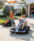 Children riding Licensed McLaren 48V Go Kart in driveway, showcasing four-position adjustable chassis and silver finish
